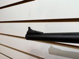 Used Remington Model 597 22 mag 19" barrel black synthetic stock and forearm golden antler scope good condition - 18 of 20