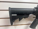 Used Bushmaster XM15-E2S 5.56 16" barrel flash hider 1 30 round magazine good condition - 4 of 17