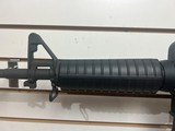 Used Bushmaster XM15-E2S 5.56 16" barrel flash hider 1 30 round magazine good condition - 17 of 17