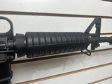Used Bushmaster XM15-E2S 5.56 16" barrel flash hider 1 30 round magazine good condition - 9 of 17