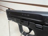 Used Smith & Wesson M&P 40 S&W4" barrel 1 14 round magazine good condition - 2 of 14