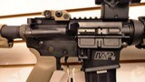 Used Smith & Wesson M&P 15 5.56 16" barrel flip up front and rear sights sparc vortex optic canvas sling good condition - 22 of 25