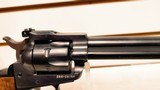 Used Ruger Single Six 5 1/2" barrel.22 and .22 mag cylinders hard plastic case manuals custom grips good condition - 15 of 20