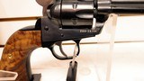 Used Ruger Single Six 5 1/2" barrel.22 and .22 mag cylinders hard plastic case manuals custom grips good condition - 14 of 20