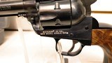 Used Ruger Single Six 5 1/2" barrel.22 and .22 mag cylinders hard plastic case manuals custom grips good condition - 6 of 20