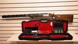 New Caesar Guerini Summit 12 gauge 32" barrel 6 gnarled chokes adj comb luggage case choke wrench tools luggage case new condition - 1 of 25
