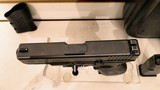 Used Glock 23 40 cal 3 glock mags removable grip cover 2 extra barrels9mm & 357 sig spare retention pins for linkage changes good condition in case - 15 of 22