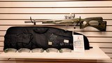 Lightly used Ruger 10/22 19" bull bbl hammer forged stainless steel Green-gralam lam. thumb stock red dot sight 6 25 rnd mags soft case good cond