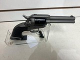 Used Ruger Wrangler 4 1/2" bbl 22lr black and gray finish good condition - 6 of 11