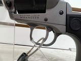 Used Ruger Wrangler 4 1/2" bbl 22lr black and gray finish good condition - 2 of 11