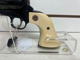Used Ruger Single Six 22LR4 1/2" bbl cream grips on blue frame very good condition - 8 of 15