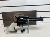 New Taylor 1873 Outlaw Legacy Blue Engraved 4.75" bbl .357 mag Ivory grips new condition - 9 of 13