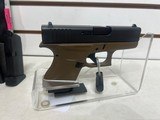 Used Glock 43 9mm 3 1/4" bbl two tone black slide with odg grips 2 mags load assist tool good condition - 2 of 10