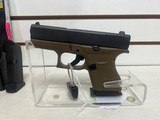 Used Glock 43 9mm 3 1/4" bbl two tone black slide with odg grips 2 mags load assist tool good condition - 7 of 10