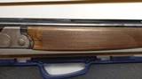 New SILVER PIGEON I SPTNG 12/32 3 J686SJ2 SPORTING OPTIMA CHK-HP
5 chokes luggage case lube lock manuals new in box - 19 of 25