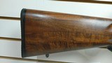 Used FN Custom 338-06 22