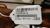 Used FN Custom 338-06 22