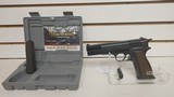 Used Browning Hi-Power 9mm 4 3/4" bbl fixed siteblue with browning grips 2 mags original box good condition - 1 of 24