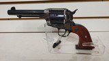 Used Ruger Vaquero 44 rem mag 5 1/2" 6 shot case hardened finish small blemish on left side wooden grips good condition - 1 of 24