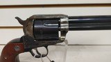 Used Ruger Vaquero 44 rem mag 5 1/2" 6 shot case hardened finish small blemish on left side wooden grips good condition - 17 of 24