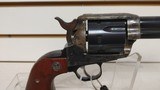 Used Ruger Vaquero 44 rem mag 5 1/2" 6 shot case hardened finish small blemish on left side wooden grips good condition - 16 of 24