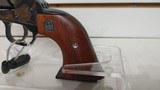 Used Ruger Vaquero 44 rem mag 5 1/2" 6 shot case hardened finish small blemish on left side wooden grips good condition - 4 of 24
