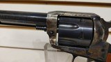 Used Ruger Vaquero 44 rem mag 5 1/2" 6 shot case hardened finish small blemish on left side wooden grips good condition - 8 of 24