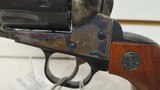 Used Ruger Vaquero 44 rem mag 5 1/2" 6 shot case hardened finish small blemish on left side wooden grips good condition - 2 of 24
