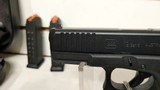 Used Glock 19 9mm 4" bbl 3 mags grip adjusters load assist tool hard plastic glock case good condition - 6 of 21