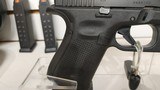 Used Glock 19 9mm 4" bbl 3 mags grip adjusters load assist tool hard plastic glock case good condition - 17 of 21