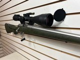 Used Remington Model 700 308 24" bblWeaver 2.5-10x56SF Scope with covers bore is clean good condition - 17 of 23