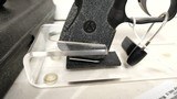 Used KAHR PM 9 9mm 2 3/4" bbl two tone good condition 2 mags 1 6 1 8 hard plastic case good condition - 10 of 15