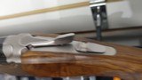 used Beretta 694 Sporting B-Fast 12 Ga 30" 5 chokes tools lube luggage case very good condition original box - 9 of 25