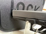 Used Glock 20 10mm 4 1/2" bbl original box 2 mags load assist tool good condition - 16 of 23