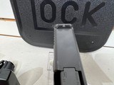 Used Glock 20 10mm 4 1/2" bbl original box 2 mags load assist tool good condition - 2 of 23