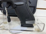 Used Glock 20 10mm 4 1/2" bbl original box 2 mags load assist tool good condition - 7 of 23