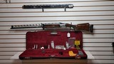 Used Browning Cynergy Trap 12 gauge 34" unsingled 7 chokes includes 32" O/U BBL tools luggage case good condition