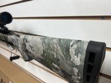 Used Savage Arms AXIS II XP TrueTimber VSX Bolt-Action Rifle with Threaded Barrel and scope - 16 of 22