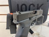 new Glock Gen 5 19 Concrete Gray Elite Black 9mm ACG-57016 new in hard plastic case 2 in stock - 9 of 9