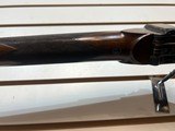 Lightly Used AXTELL Sharps Model 1877 45 2 1/10 with Peepsights and case plus rod and case very good condition Reduced again - 24 of 25
