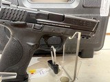 Lightly Used S&W M&P 9 4" bbl 9mm stainless blue on blue 2 magazine original hard case - 2 of 13