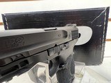 Used S+W M+P M2.0 CMPT 9MM 15R B FS original box 2 mags original box grip adjusters good condition - 4 of 18