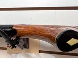 Used Remington 1100 12 Gauge 26" bbl fixed choke skeet good condition - 9 of 25