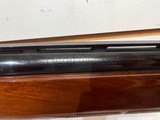 Used Remington 1100 12 Gauge 26" bbl fixed choke skeet good condition - 11 of 25