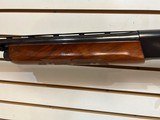 Used Remington 1100 12 Gauge 26" bbl fixed choke skeet good condition - 6 of 25