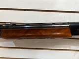 Used Remington 1100 12 Gauge 26" bbl fixed choke skeet good condition - 10 of 25