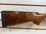 Used Remington 1100 12 gauge 28" bbl fixed choke skeet good condition - 5 of 19