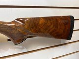 Used Remington 1100 12 gauge 28" bbl fixed choke skeet good condition - 3 of 19