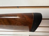 Used Remington 1100 12 gauge 28" bbl fixed choke skeet good condition - 7 of 19