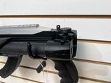 Used Ruger 10/22 22LR 16" bbl 1 25rnd mag after market foldable stock good condition - 11 of 21
